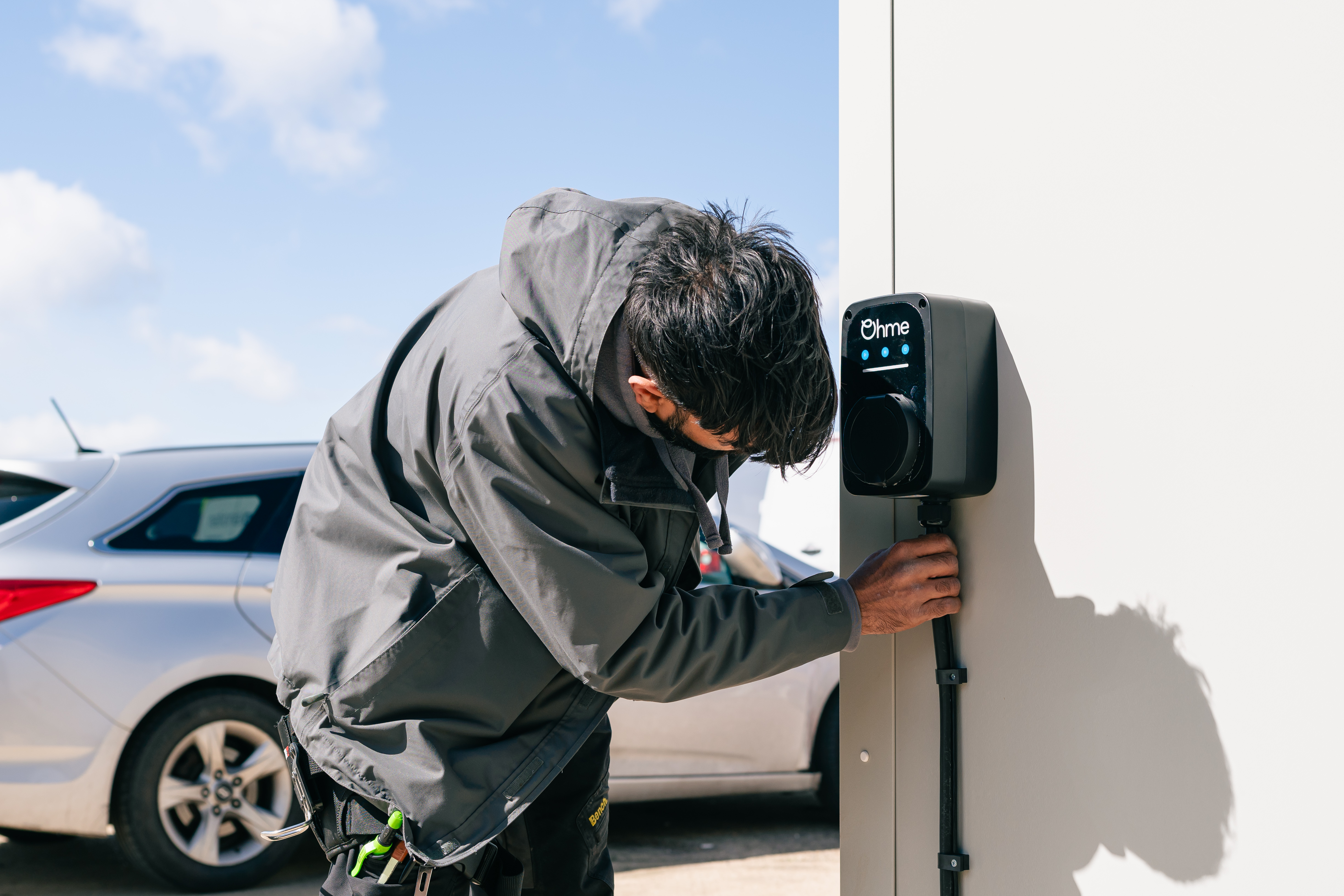 Final touches on an Ohme home charger installation